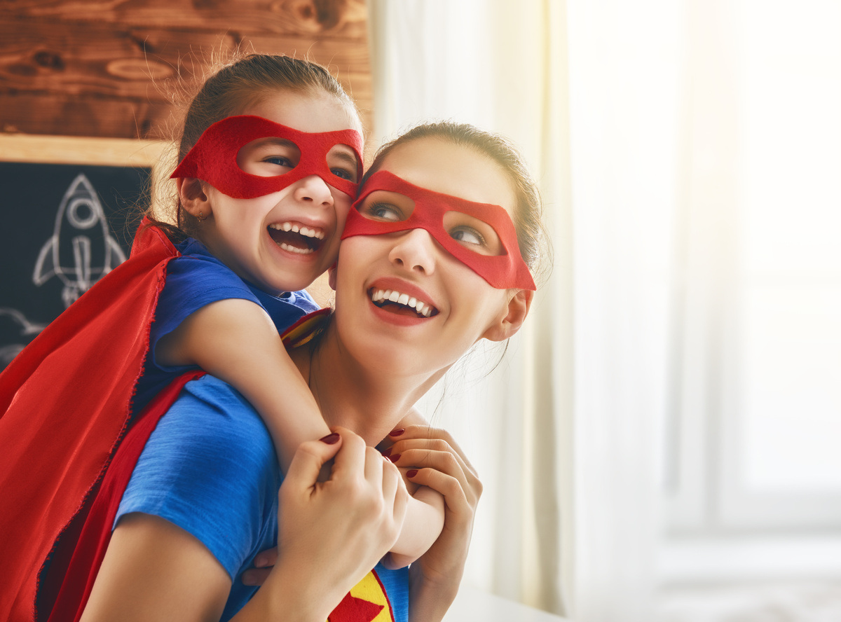 Girl and Mom in Superhero Costume